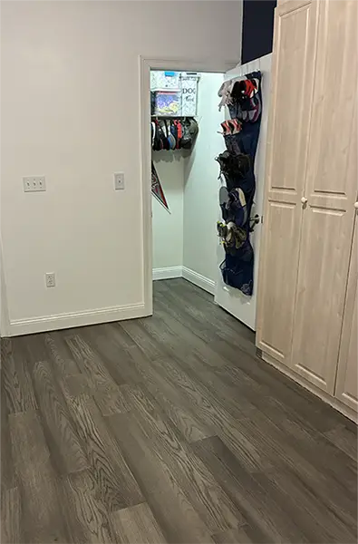 Beach front condo bedroom engineered hardward floor install carpet replacement closet AFTER Grunt Laborers June 2026 Beach front condo bedroom engineered hardward floor install carpet replacement closet AFTER Grunt Laborers June 2026